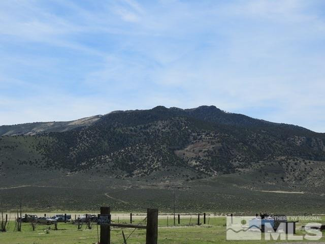 505 McNeil Road Winnemucca, NV 89445 - Photo 12 of 12 a view of a lake with a mountain in the background