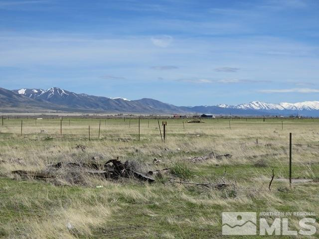 505 McNeil Road Winnemucca, NV 89445 - Photo 6 of 12 a view of a lake with a mountain in the background