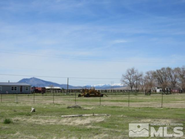 505 McNeil Road Winnemucca, NV 89445 - Photo 10 of 12 a view of a golf course with a lake