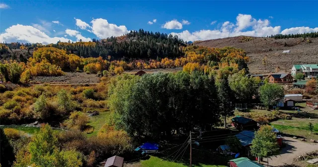 a view of a houses with a yard