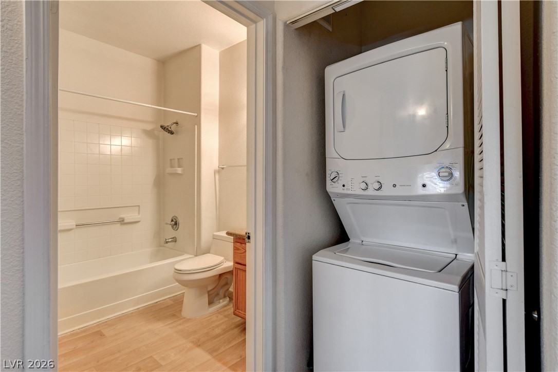 3318 North Decatur Boulevard, Unit 1069 Las Vegas, NV 89130 - Photo 17 of 39 Functional full bathroom and convenient laundry facilities offer complete utility.