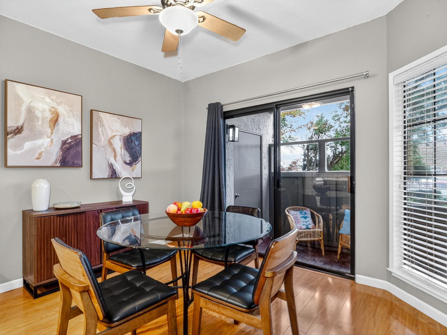 425 Kenbrook Circle San Jose, CA 95111 - Photo 13 of 46 a view of a dining room with furniture and wooden floor