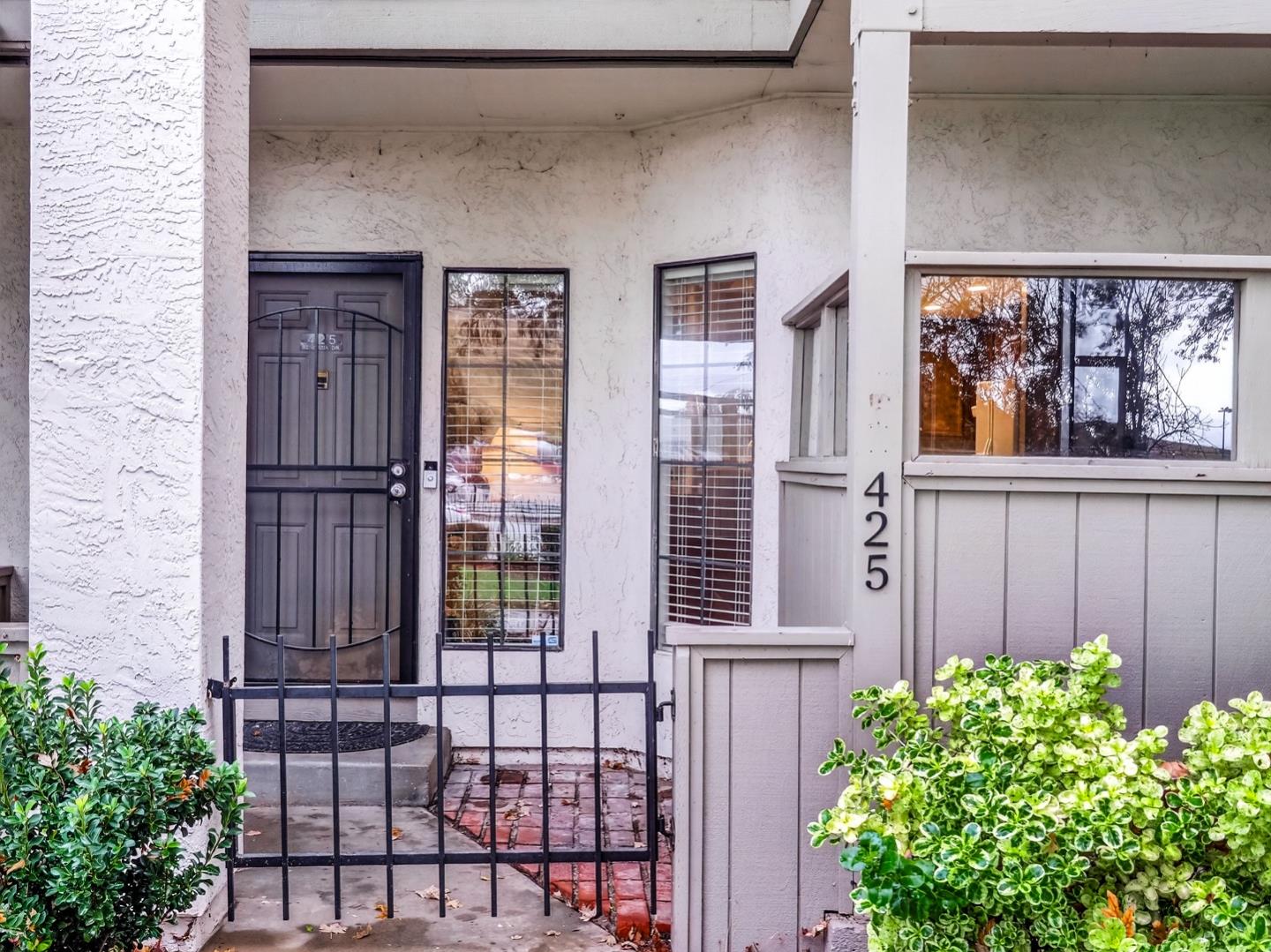 425 Kenbrook Circle San Jose, CA 95111 - Photo 2 of 46 a view of a house with a small window and wooden fence