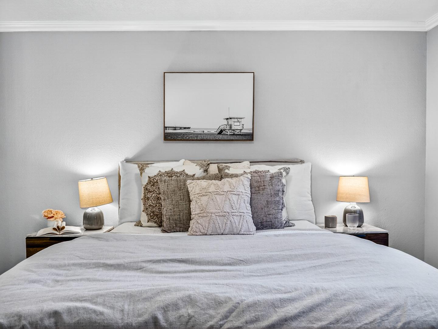 425 Kenbrook Circle San Jose, CA 95111 - Photo 22 of 46 a bedroom with a bed and a painting on the wall