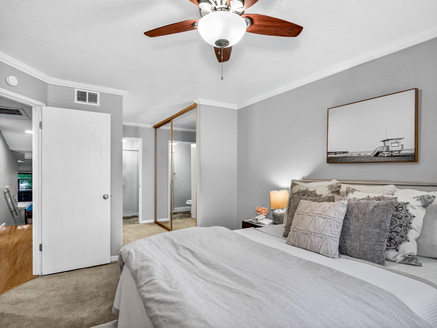 425 Kenbrook Circle San Jose, CA 95111 - Photo 23 of 46 a bedroom with a bed and a chandelier