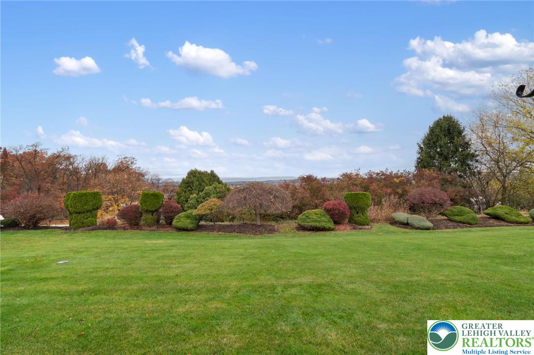 116 Allison Place Blandon, PA 19510 - Photo 16 of 24 a view of a field of grass and building