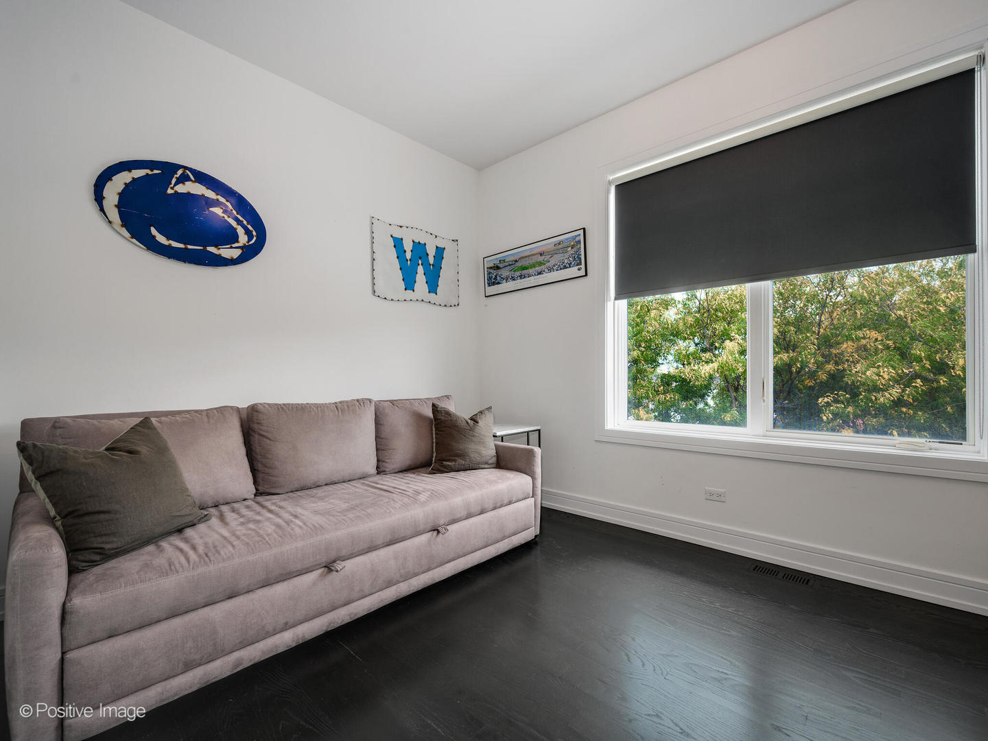 2922 North Sheffield Avenue, Unit 3 Chicago, IL 60657 - Photo 17 of 28 a living room with furniture and a large window