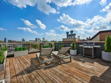 a view of a terrace with seating space