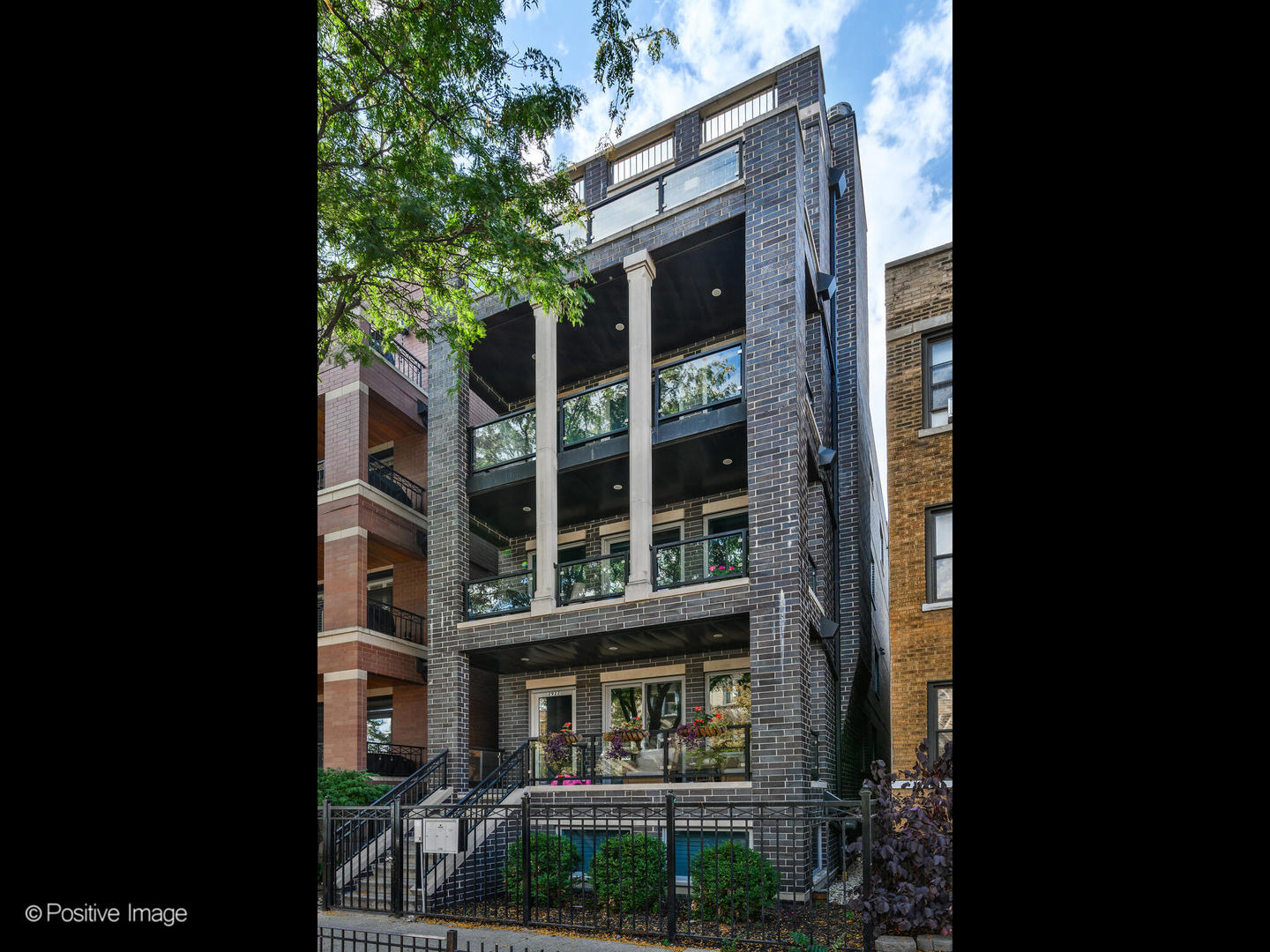 2922 North Sheffield Avenue, Unit 3 Chicago, IL 60657 - Photo 28 of 28 a view of building with a window and a tree