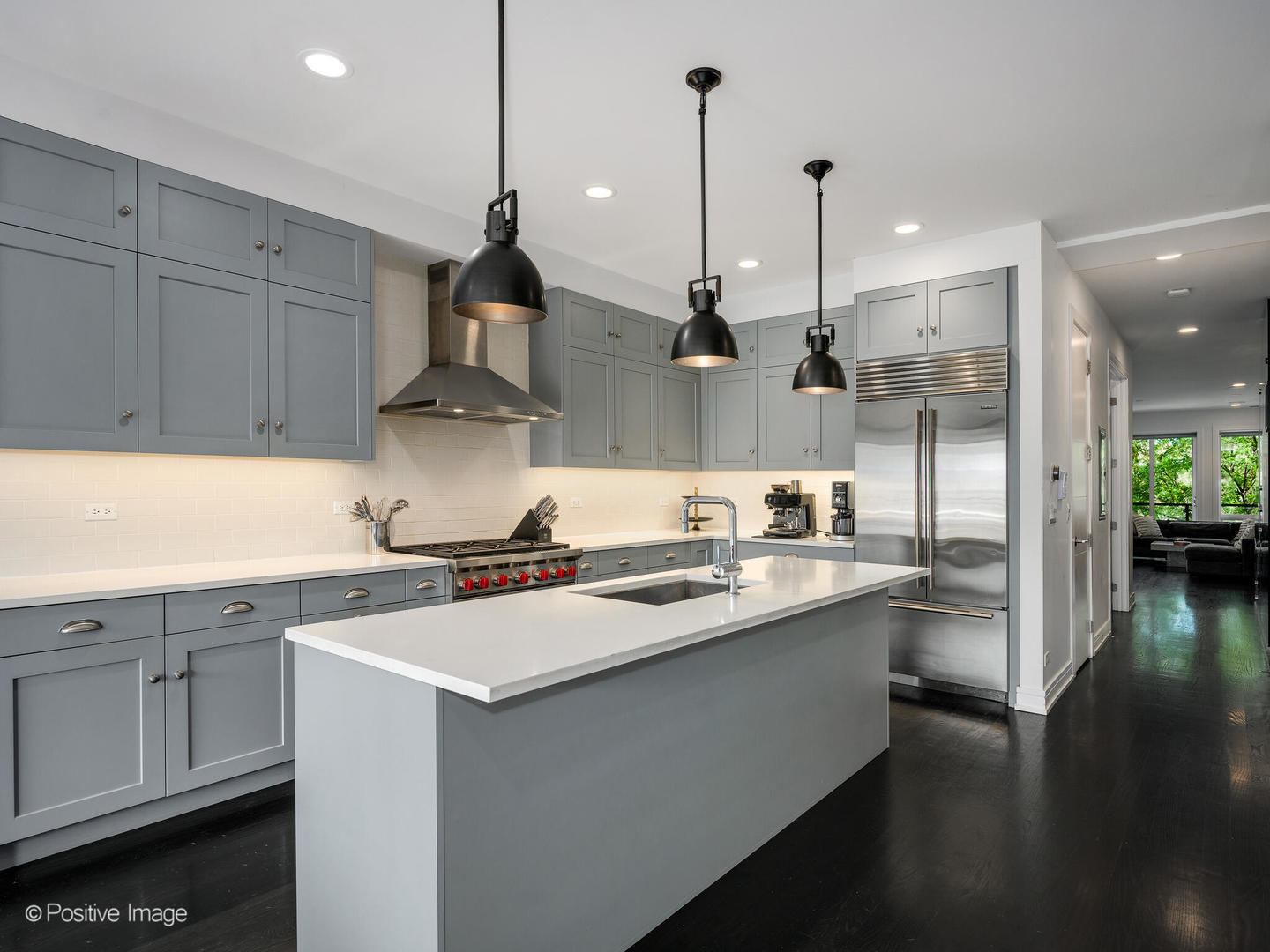 2922 North Sheffield Avenue, Unit 3 Chicago, IL 60657 - Photo 10 of 28 a kitchen with stainless steel appliances granite countertop a sink a stove and a refrigerator