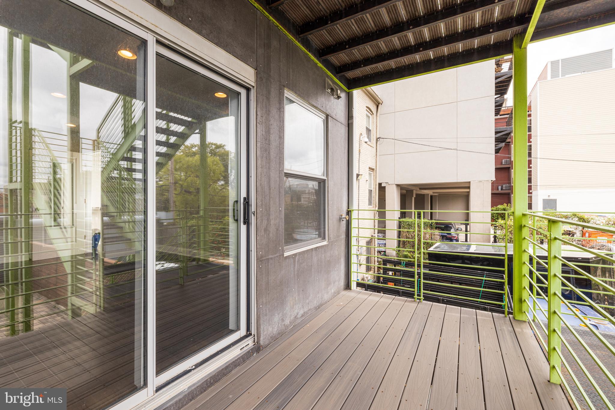 1815 Benning Road Northeast, Unit 2 Washington, DC 20002 - Photo 11 of 12 a view of outdoor space with deck and furniture