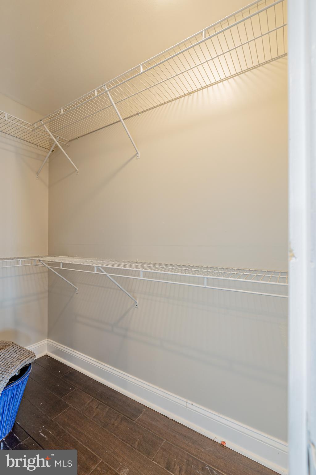 1815 Benning Road Northeast, Unit 2 Washington, DC 20002 - Photo 10 of 12 a view of a room with racks on the wall