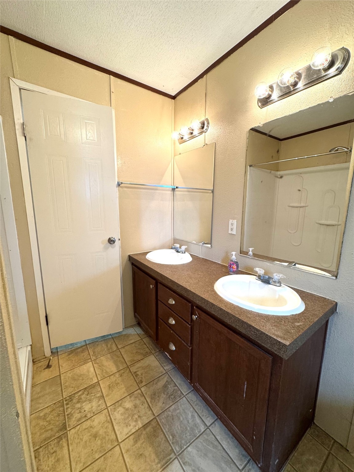 1810 Connorvale Road Houston, TX 77039 - Photo 14 of 23 a bathroom with a sink and a mirror