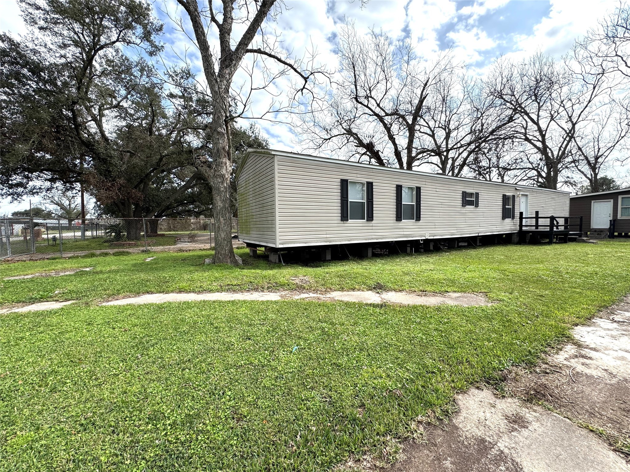 1810 Connorvale Road Houston, TX 77039 - Photo 2 of 23 a house view with a sitting space and garden