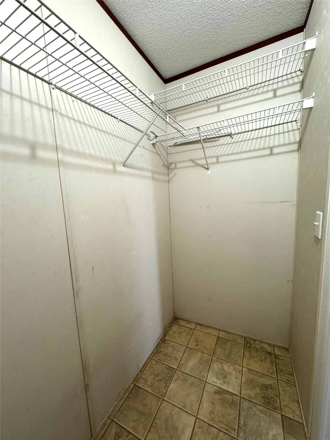 1810 Connorvale Road Houston, TX 77039 - Photo 21 of 23 a view of a room with racks on the wall