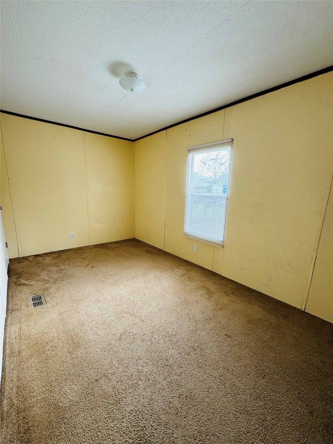 1810 Connorvale Road Houston, TX 77039 - Photo 8 of 23 an empty room with a empty space and a window