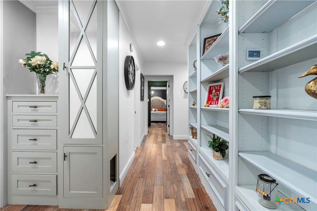 308 Liberty Street Gatesville, TX 76528 - Photo 18 of 41 a view of kitchen with furniture and wooden floor
