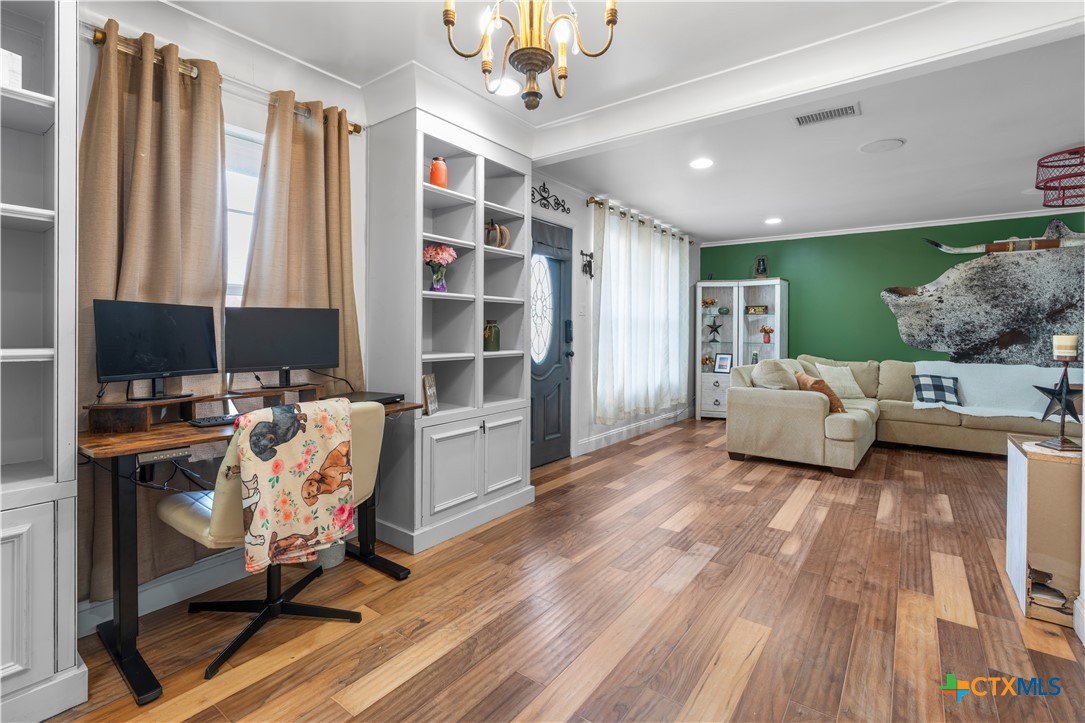 308 Liberty Street Gatesville, TX 76528 - Photo 2 of 41 a view of a livingroom with furniture and a window