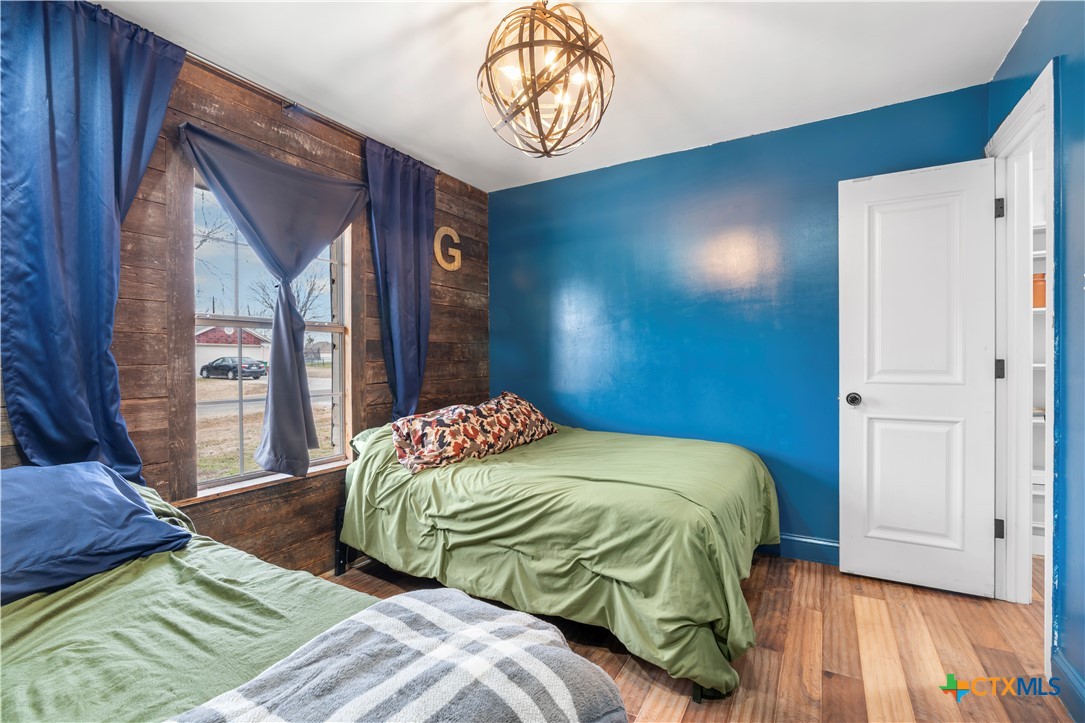 308 Liberty Street Gatesville, TX 76528 - Photo 23 of 41 a bedroom with a bed and a window