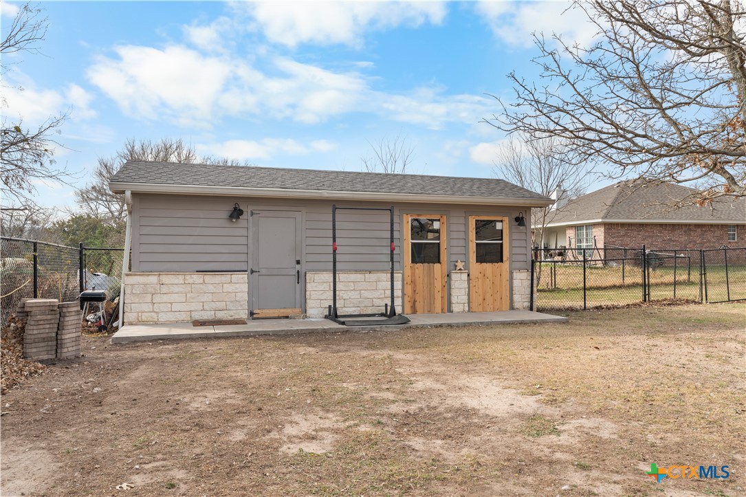 308 Liberty Street Gatesville, TX 76528 - Photo 36 of 41 a front view of a house with a garage