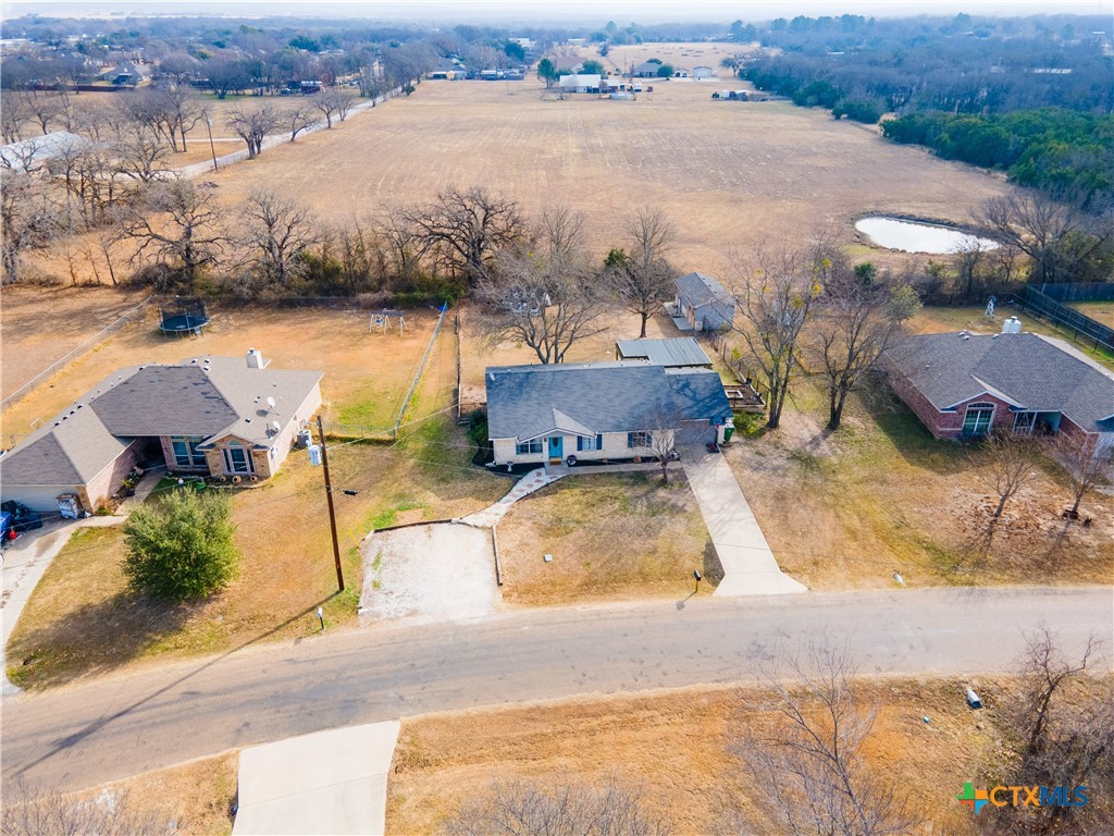 308 Liberty Street Gatesville, TX 76528 - Photo 40 of 41 an aerial view of a house with lake view