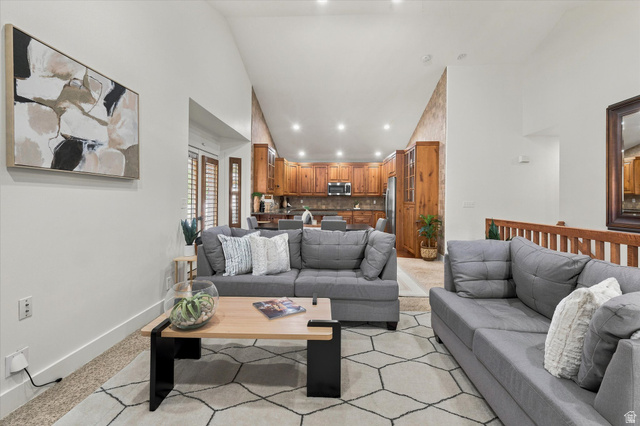 689 Apple Drive Logan, UT 84321 - Photo 7 of 52 Vaulted ceilings illuminate the living area with recessed lighting