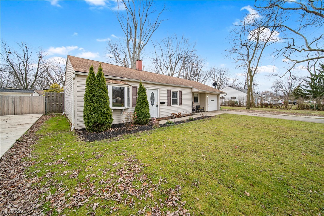 4887 Orchard Road Mentor, OH 44060 - Photo 2 of 26 Ranch-style home with a front yard