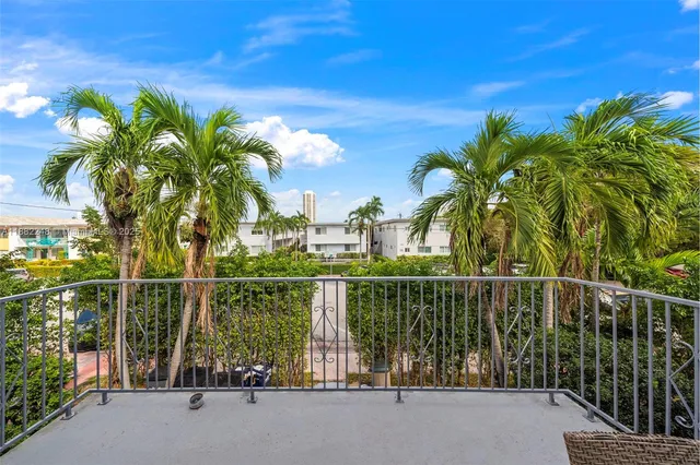 a view of a balcony with lake view
