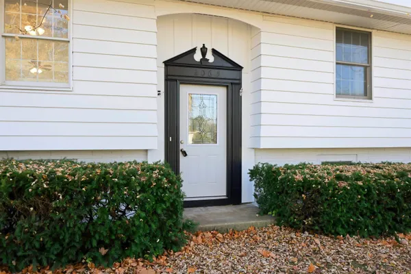 a view of a workspace with furniture