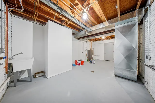 a view of a balcony with wooden floor and fence