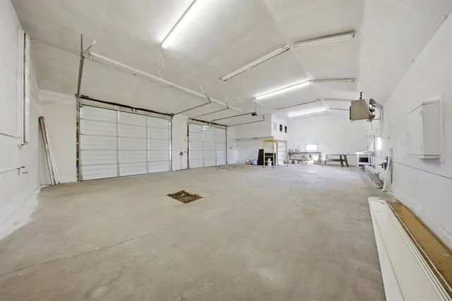 a view of a open shower and a window