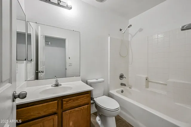 a bathroom with a sink toilet a shower and bathtub