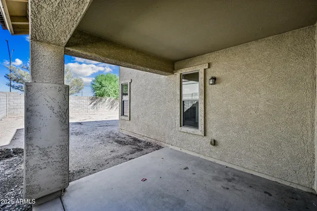 a view of a front door and porch