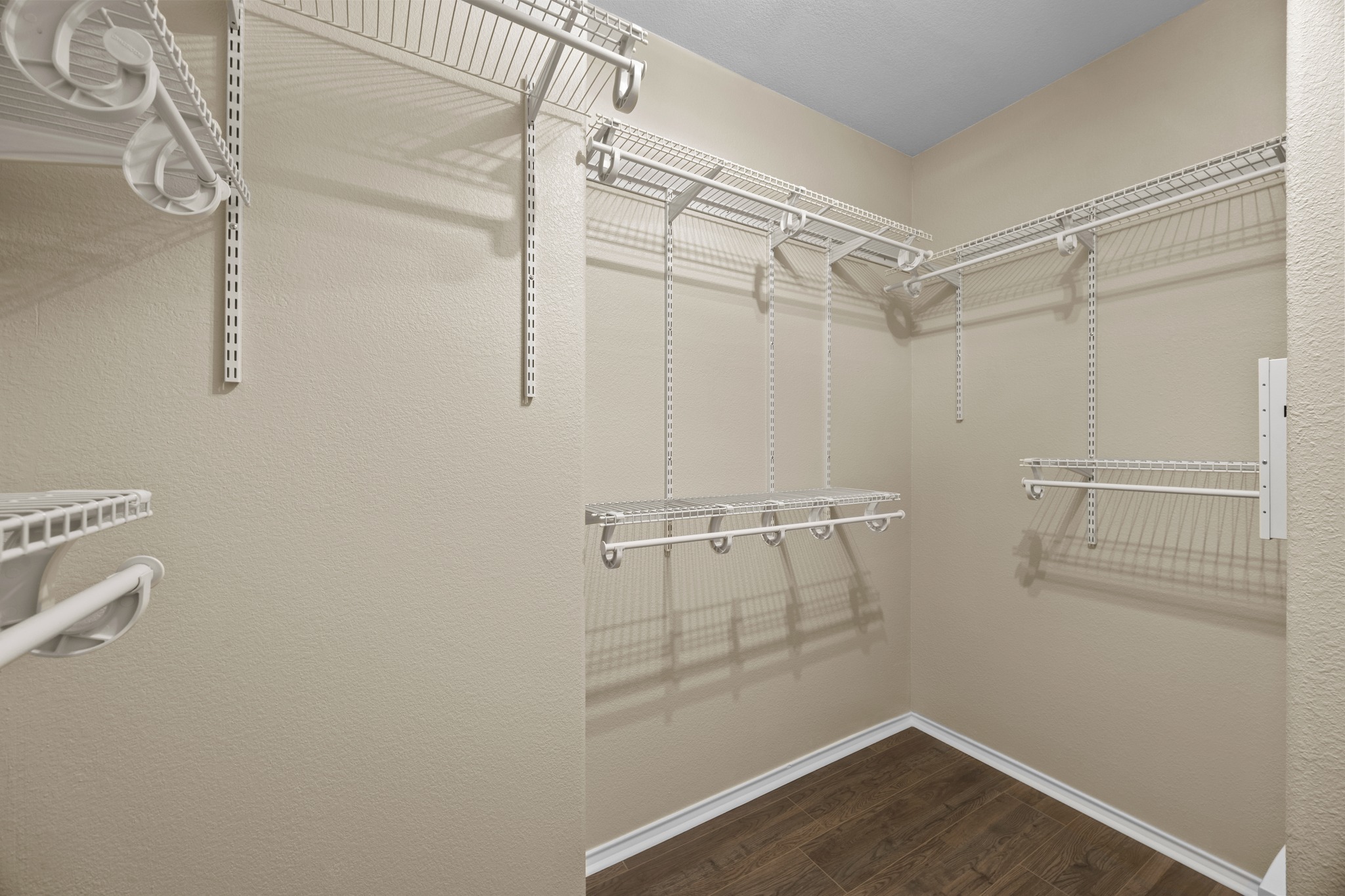 1125 Yellow Iris Road Leander, TX 78641 - Photo 27 of 31 Walk in closet featuring dark wood-style floors