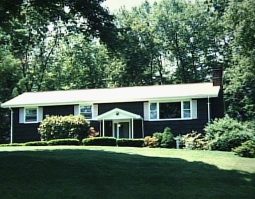 2 Spruce Hill Road Shelton, CT 06484 - Photo 1 of 1 a front view of a house with garden