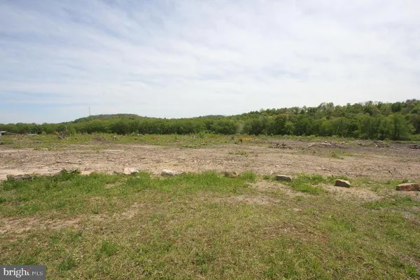 a view of lake with mountain