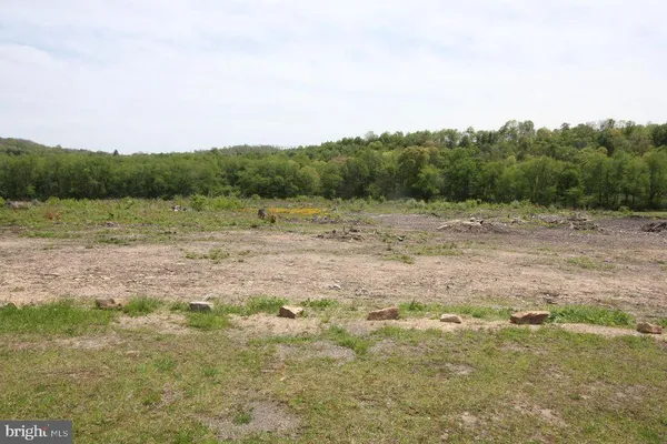 a view of an outdoor space and mountain view