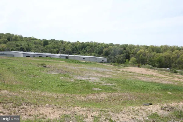 a view of a lake with a big yard