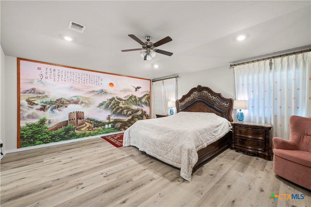 1305 Roma Street Harker Heights, TX 76548 - Photo 18 of 28 a bedroom with a bed couch and window