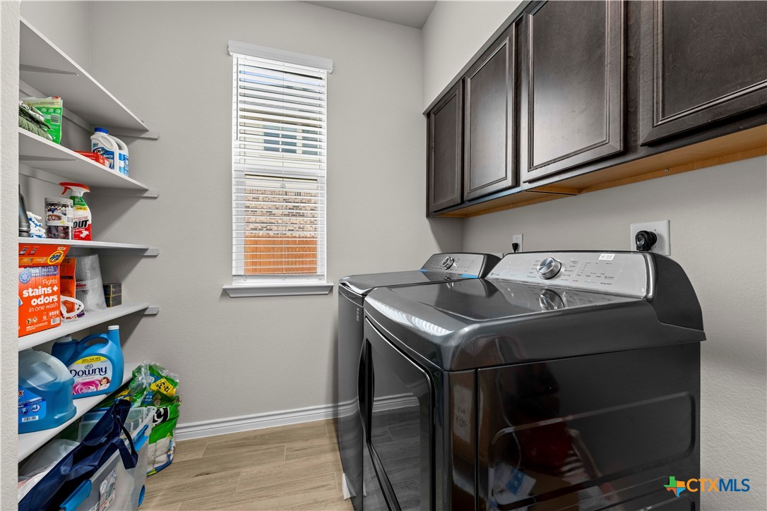 1305 Roma Street Harker Heights, TX 76548 - Photo 24 of 28 a utility room with dryer and washer