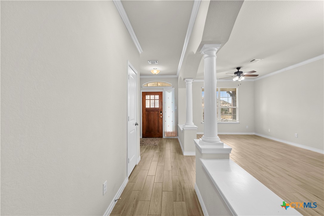 1305 Roma Street Harker Heights, TX 76548 - Photo 25 of 28 wooden floor in a hall with an entryway