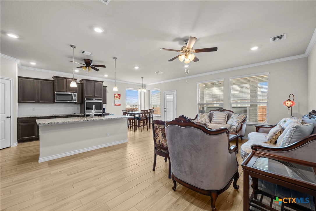 1305 Roma Street Harker Heights, TX 76548 - Photo 28 of 28 a living room kitchen with furniture and kitchen view