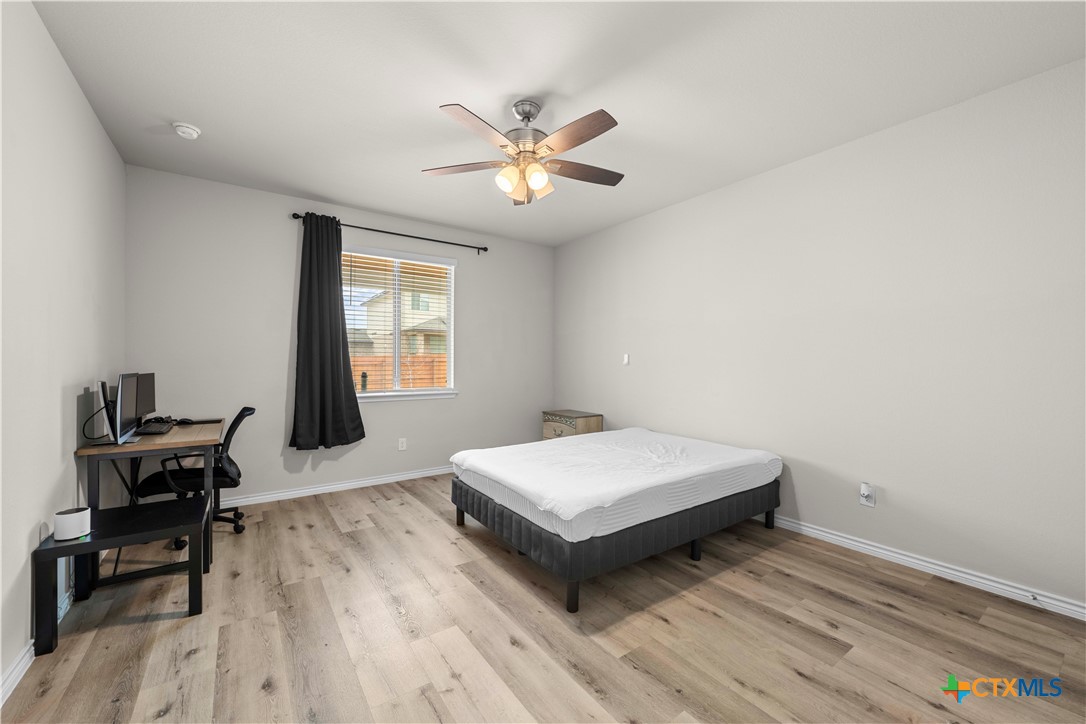 1305 Roma Street Harker Heights, TX 76548 - Photo 9 of 28 a bedroom with a bed and a window