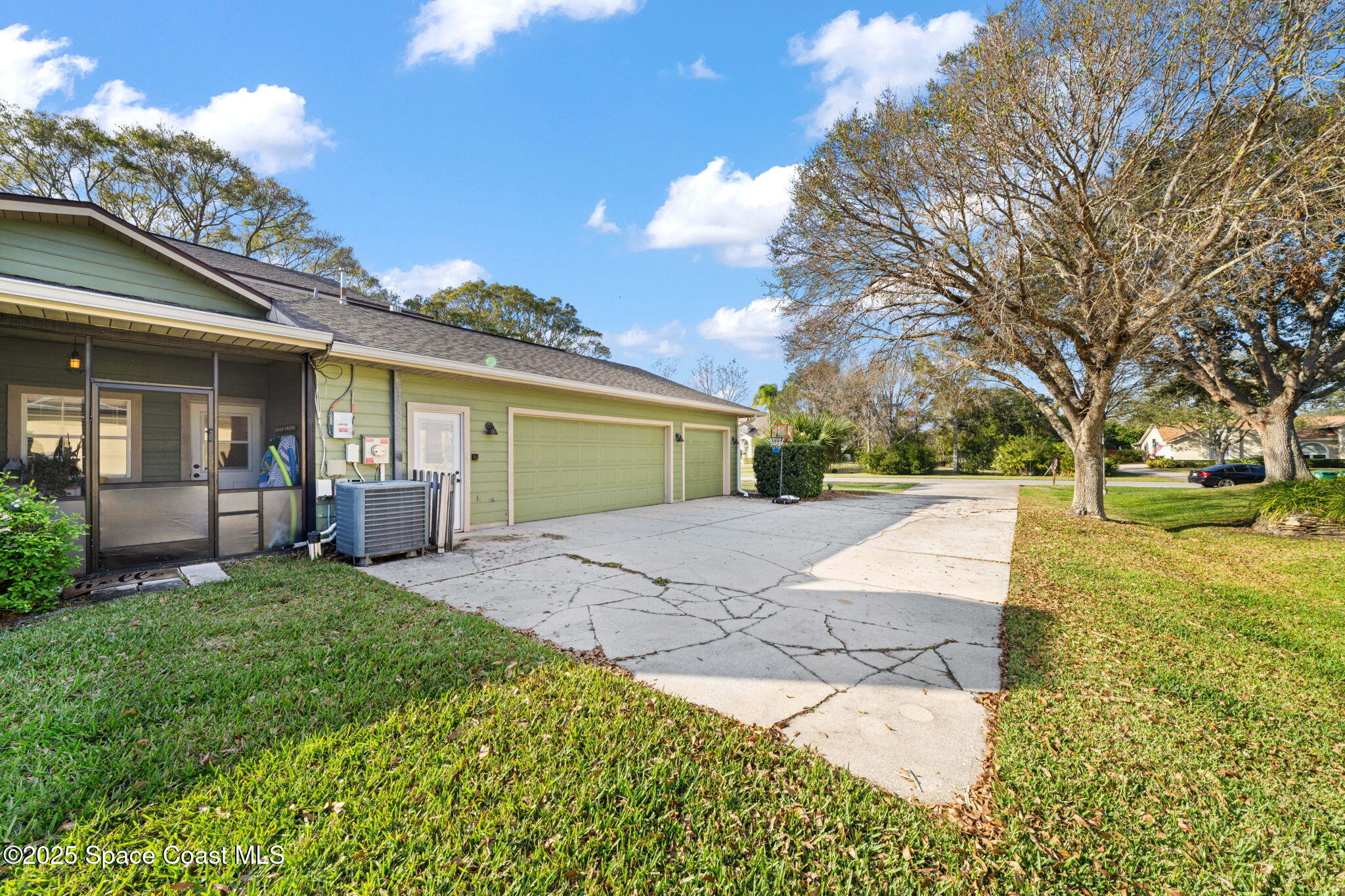 3705 Eagle Way Melbourne, FL 32934 - Photo 12 of 47 a view of a yard with plants and trees