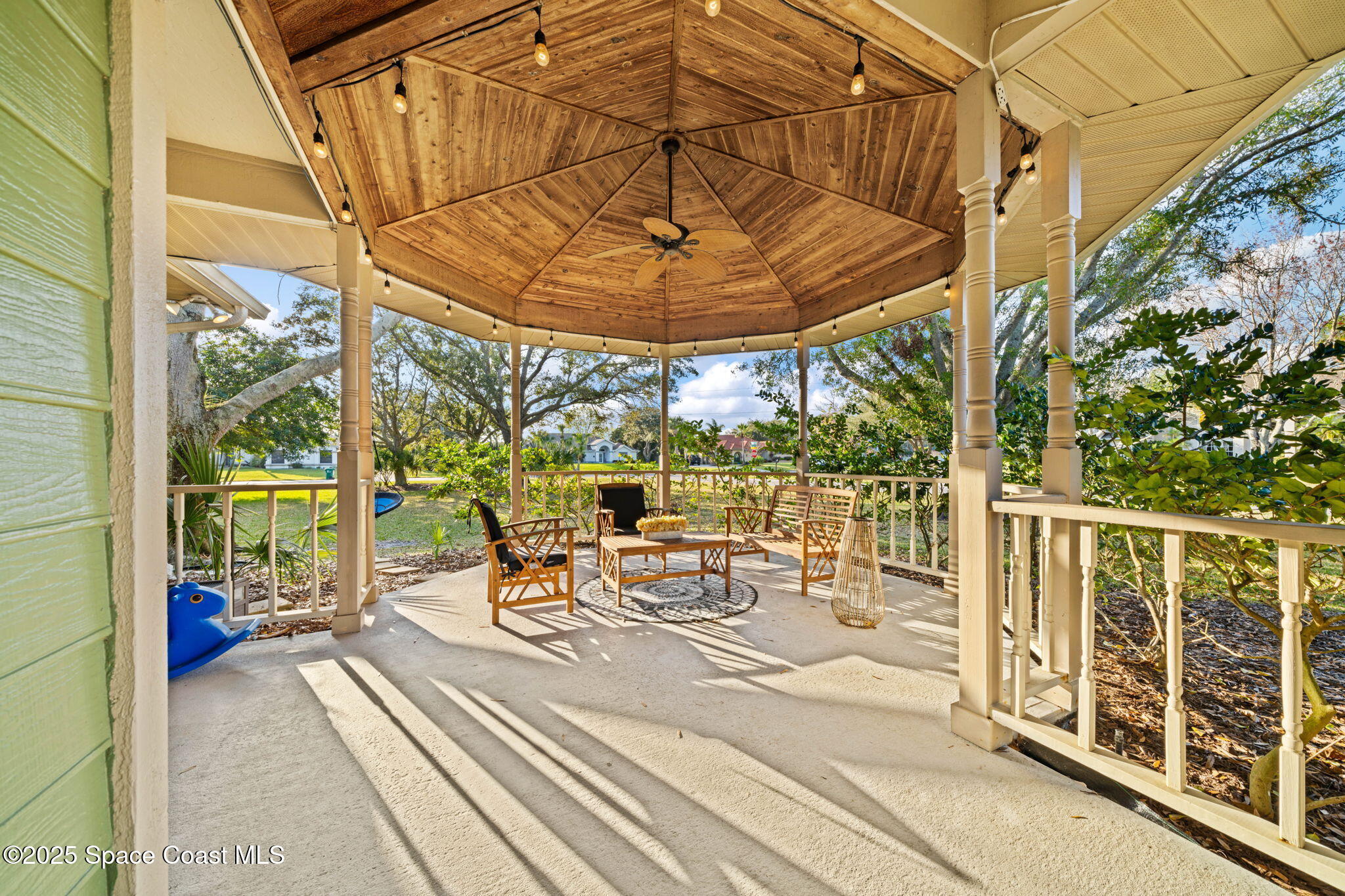 3705 Eagle Way Melbourne, FL 32934 - Photo 3 of 47 a view of a patio with a table and chairs