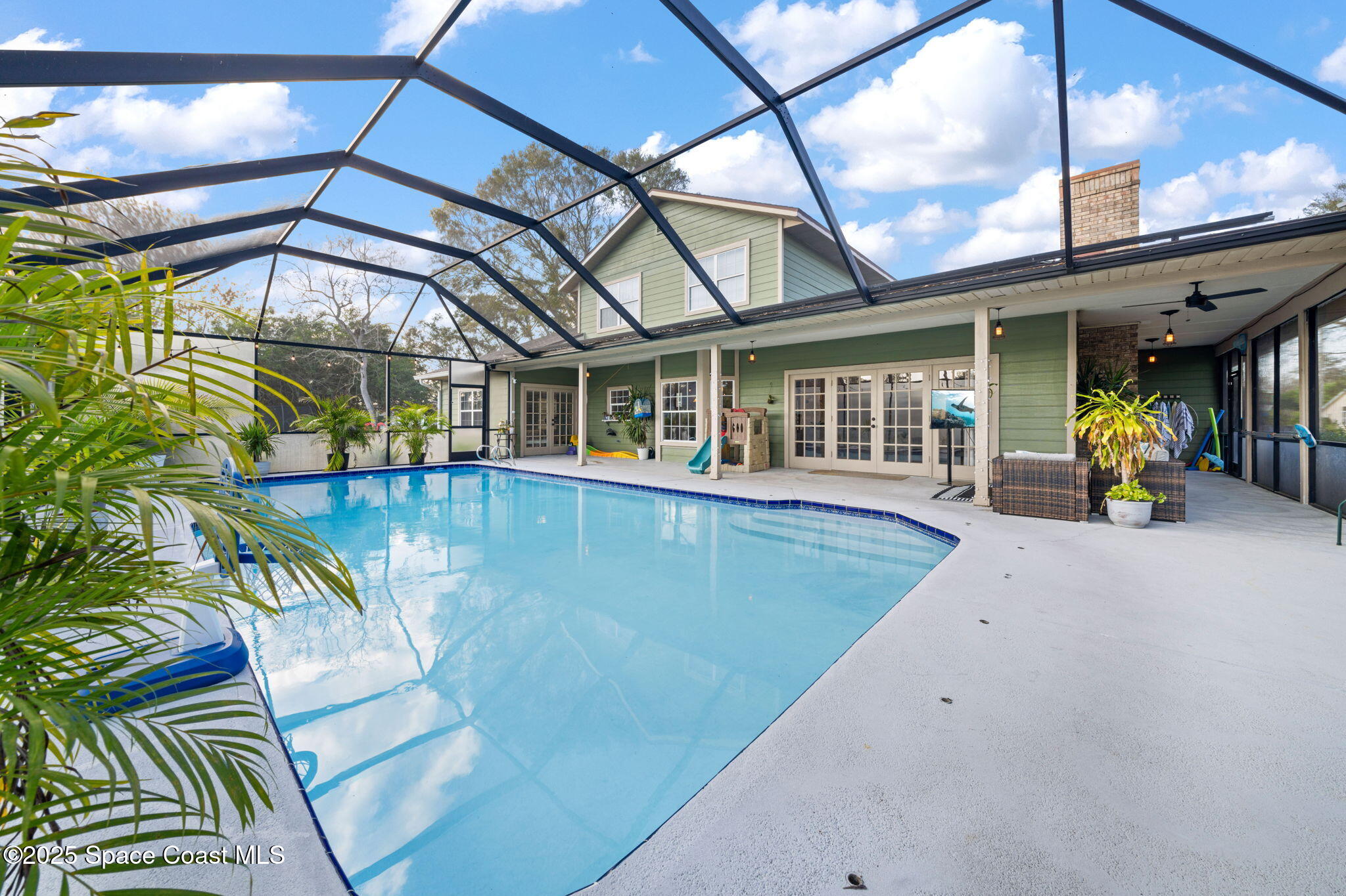 3705 Eagle Way Melbourne, FL 32934 - Photo 44 of 47 a view of a house with a swimming pool
