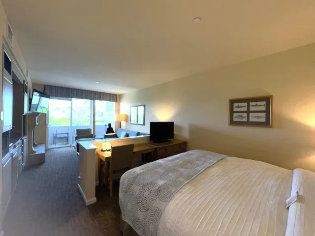 a bed room with a bed and a table