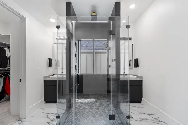 a kitchen with a sink a washer and dryer