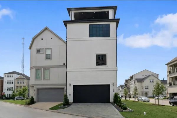 a stove top oven sitting inside of a kitchen