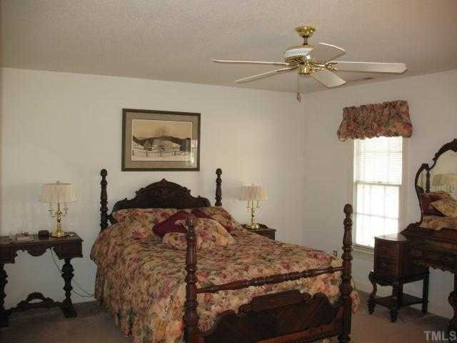 4125 Worley Drive Raleigh, NC 27613 - Photo 7 of 12 Master Bedroom